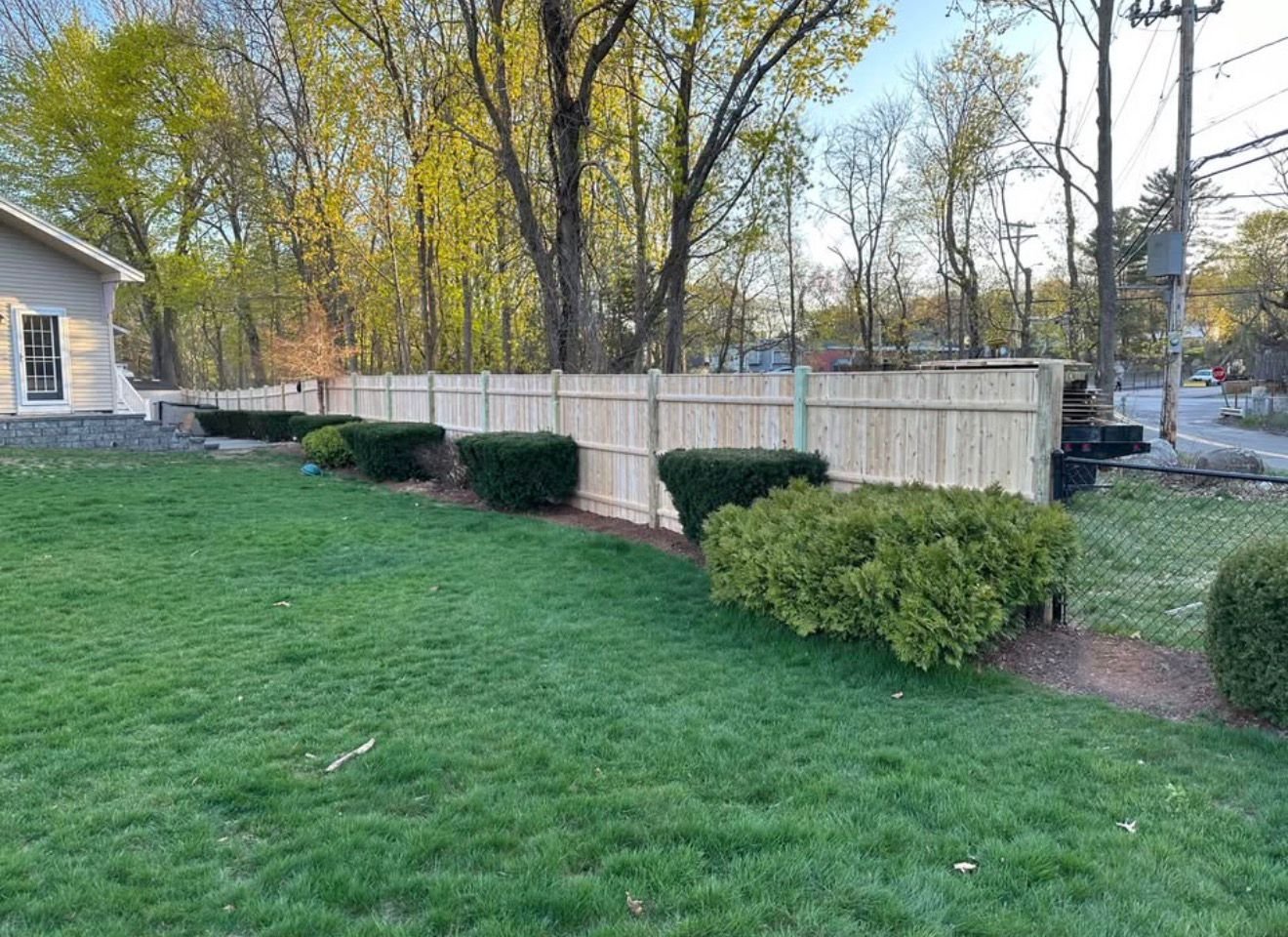 Shadow box wood fence corner installation