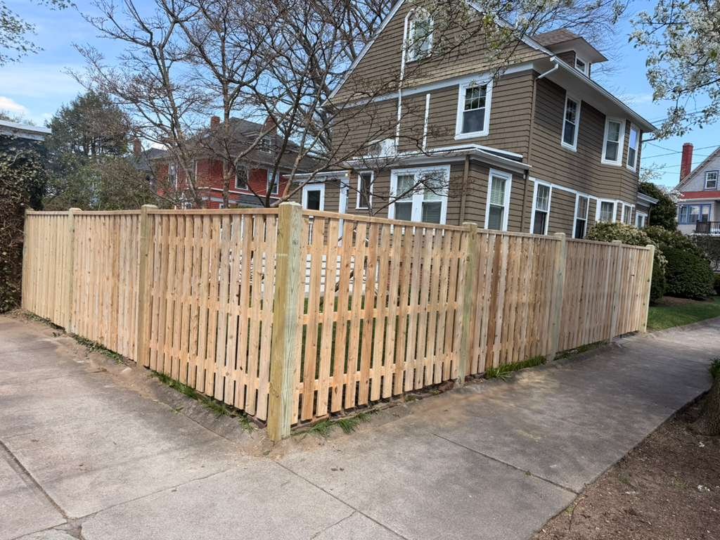 Wood picket fence, residential property